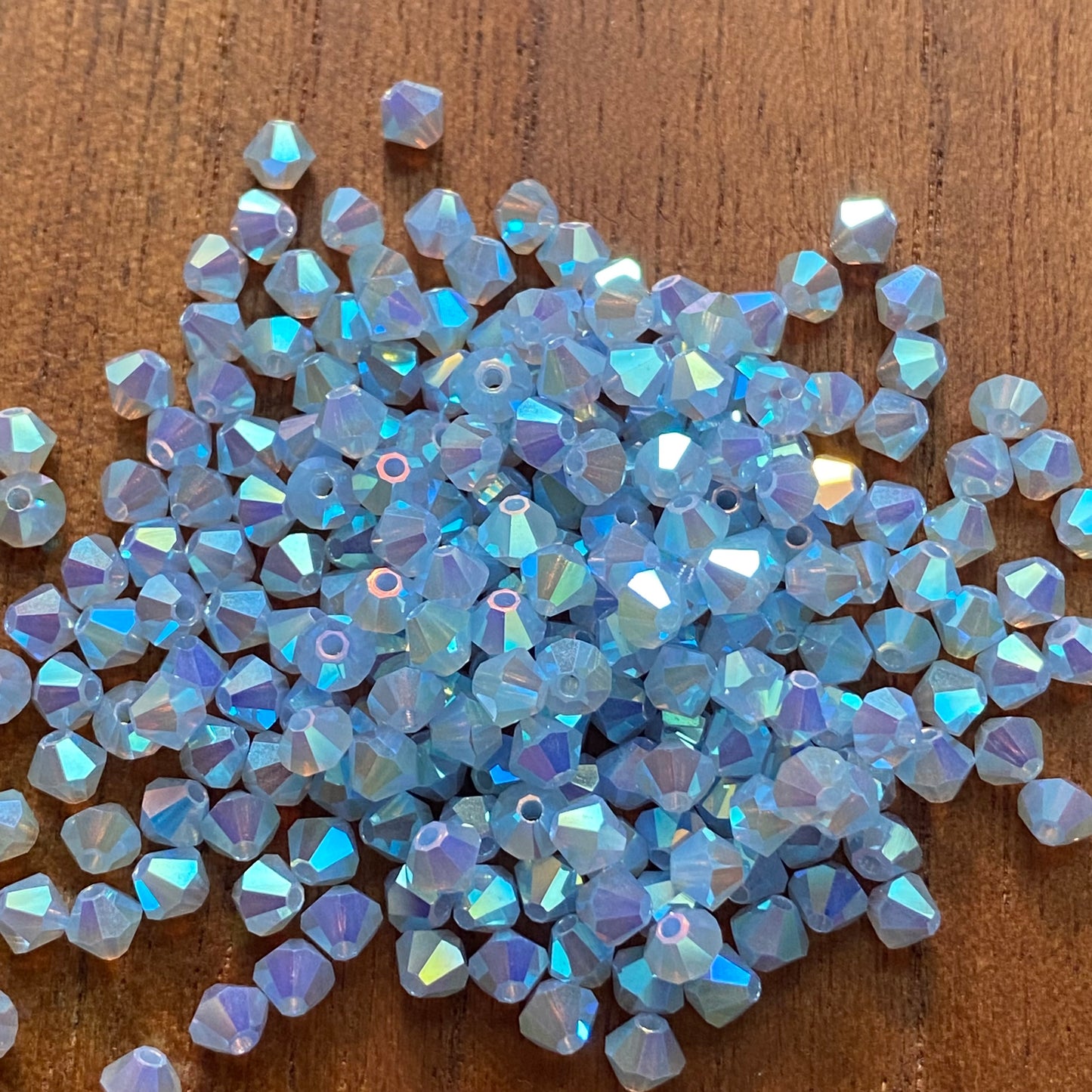 Preciosa 451 69 302 Rondelle Bicone Bead 4mm Crystal Light Blue Opal ABx2