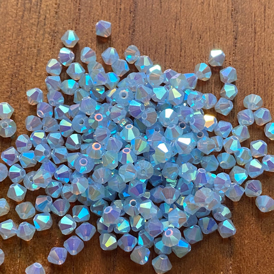 Preciosa 451 69 302 Rondelle Bicone Bead 4mm Crystal Light Blue Opal ABx2